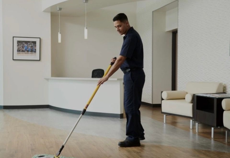 Professional floor cleaning with a dust mop