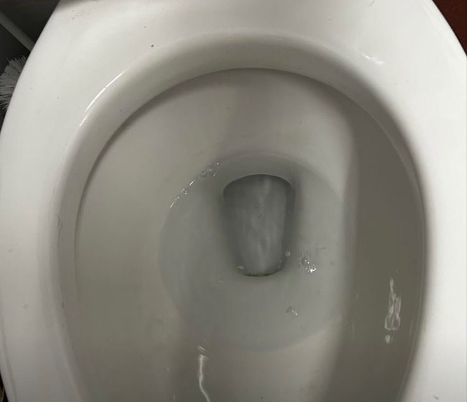 Same toilet bowl sparkling clean after Rebekah’s Cleaning Service